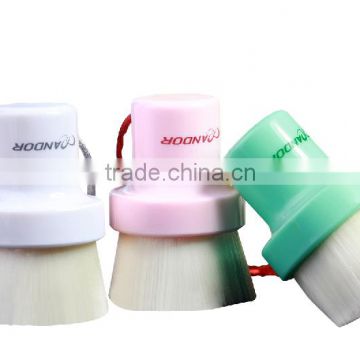 Facial cleansing brush with handle