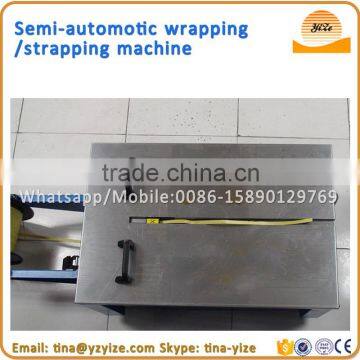 low Desk Semi automatic carton box Strapping Machine pp strapping roll making machine