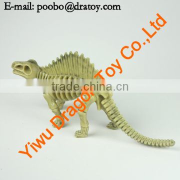 small plastic toy dinosaur skeleton