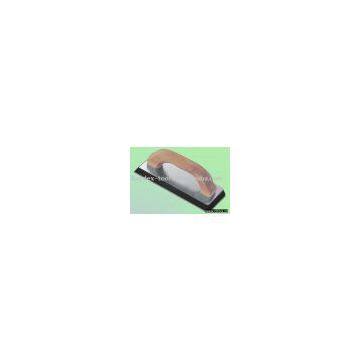 Gum rubber float trowel with wooden handle