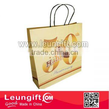 Gift bag with paper handle