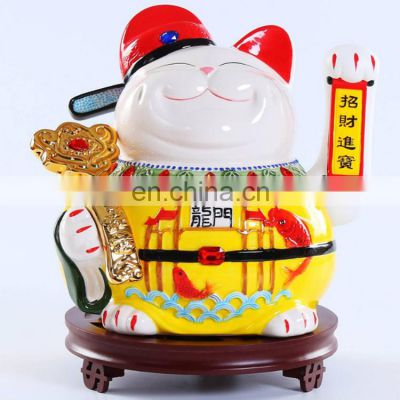 wholesale Chinese style electric shaking hands 11 inch ceramic lucky cat opening gift ornaments