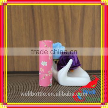 Empty lipstick tube with metal core for paper tube with pink lipstick tube