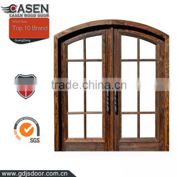 rustic glazed knotty pine wood arched french doors interior