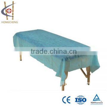 Disposable waterproof examination bed cover with elastic