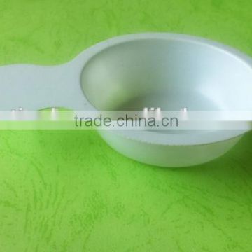 white disposable plastic tray for urine testing.