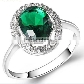 Big green stone shiny silver ring