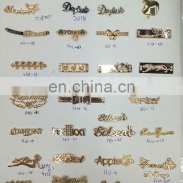 Fashion clothing metal logo accesories sew on or pin on or nail on clothing bags or shoes