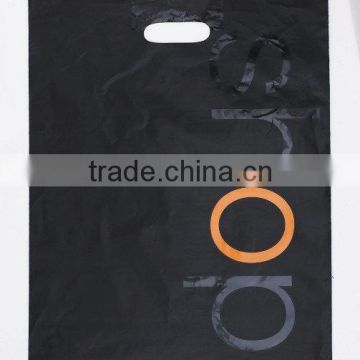 Welded patch plastic handle bag