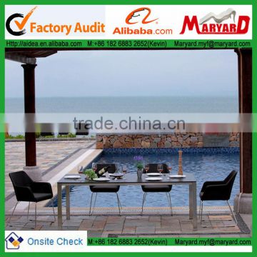 outdoor glass dining table rattan chair set