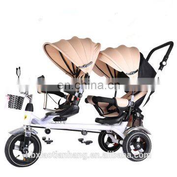 Twin best sale baby tricycle