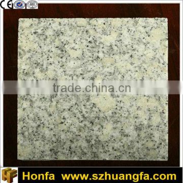 Chinese cheap light yellow spot polished granite
