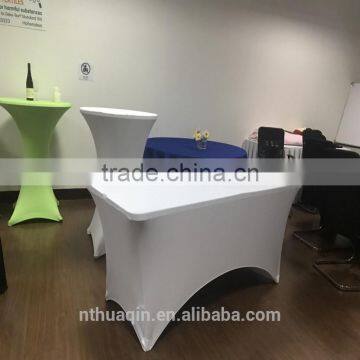 table with fitted stretch table cover and rectangle tablecloth