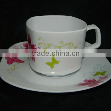 Plastic melamine cup with coaster attached