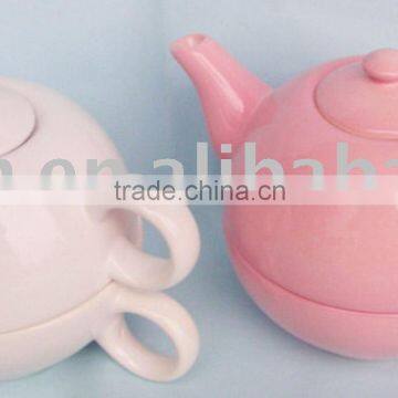 ceramic teapot with cup