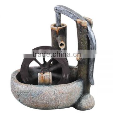 Resin decorative large outdoor water fountain with light and rolling wheel