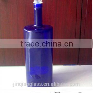 Blue vodka glass bottle with glass stopper