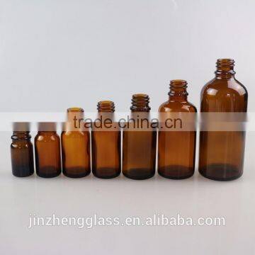 Small amber glass bottle for essential oil