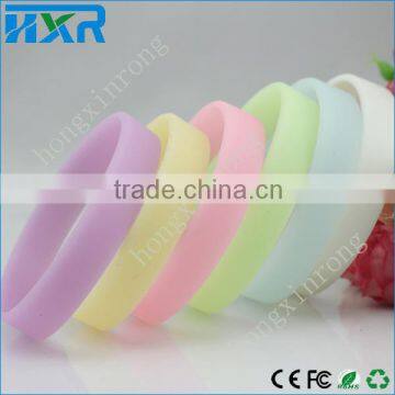 Cheap custom glow in the dark embossed and printed silicone rubber wristbands