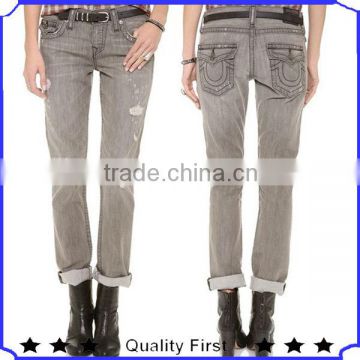 good quality shredded holes and hazy whiskering deconstruct jeans with 3 button fly