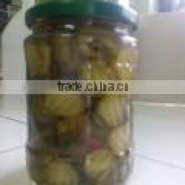 Fresh pickles slices in 540 ml jars
