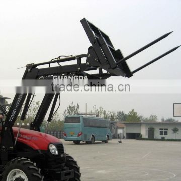 Bale spear loader for farm tractors