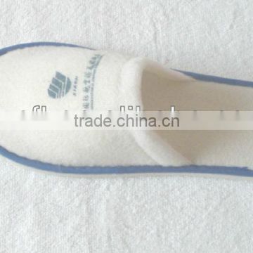 White terry towel hotel slippers