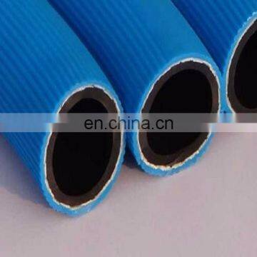 Blue 300 PSI coiled polyurethane air hose for air compressor