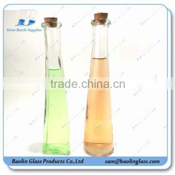 Clear glass triangle shaped bottle