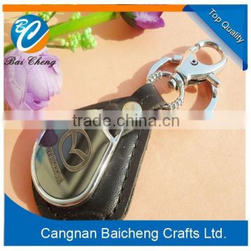 Promotional metal keychain with leather supplies top quality