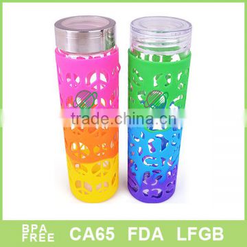 Single wall glass tumbler with silicone sleeve round bottom