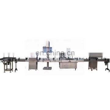 Automatic small liquid bottle filling capping and labeling machine