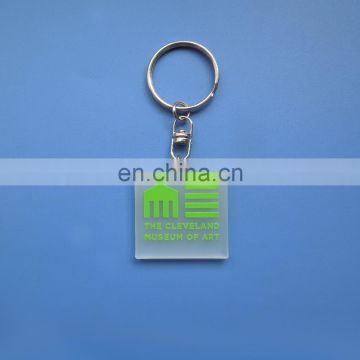 Square shape customzied embossed green logo transparent soft pvc keychain