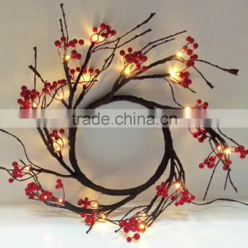 lighted red berry christmas wreath