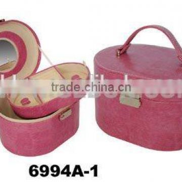 Oval faux leather jewelry box with tray