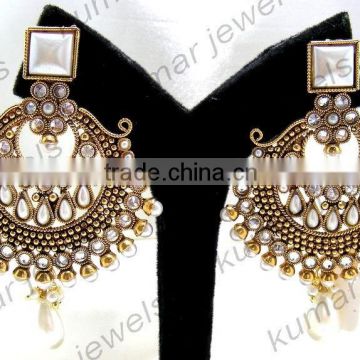 Ethnic Dull Golden Earrings With Pearl