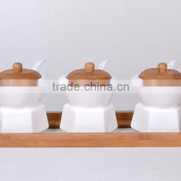 high quality wholesale ceramic spice bottles with wood lid/spice racks jars wholesale/3pcs set ceramic storage jar whole sale