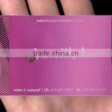 pink colored metal business card