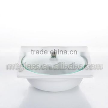 white ceramic bakeware pot with glass cover