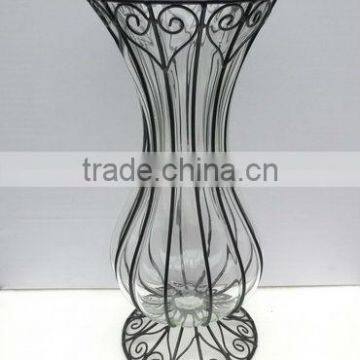 Wire with blown glass flowr vase