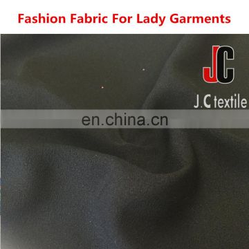 ShaoXing JC textile fabric importer market wholesale polyester slip soft dyed fabric pure crepe knit fabric
