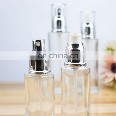 frosted glass cosmetic bottle with pump round bottle spray dropper lotion bottle and jars silver gold pump 50ml 100ml 150ml