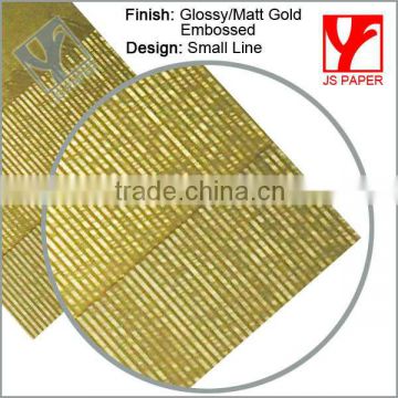 Shiny golden embossed metallic paper
