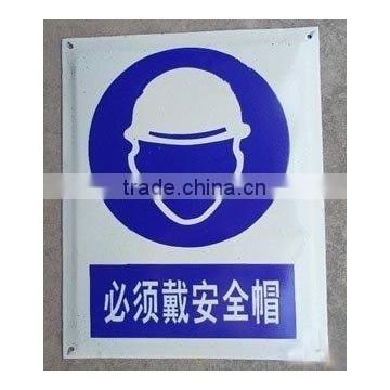 hanging construction sign with holes