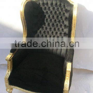 antique capitone black armchair