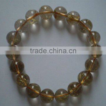 Golden rutilated quartz bracelets,pendants,crystal barcelets,pendants,lolite bracets etc