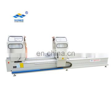 Double head angle cutting machine for aluminum door and window
