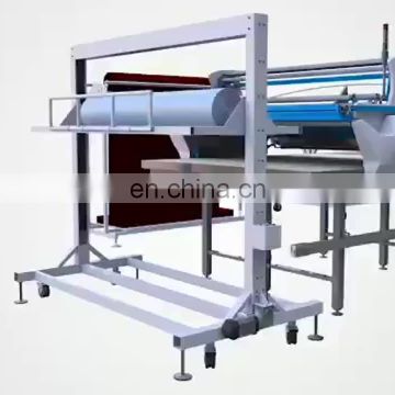 Non woven automatic fabric spreading machine