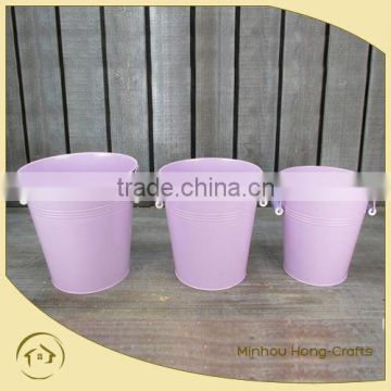 painted outdoor pink metal planters