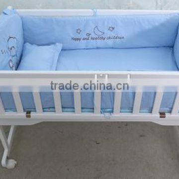 Pine wood baby cot bed with small cradle inside
